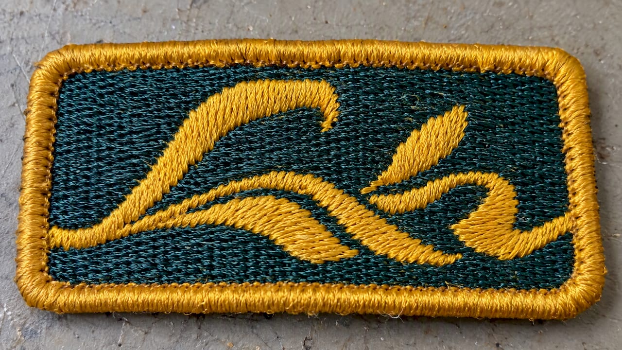 Fine woven lettering visible in a patch